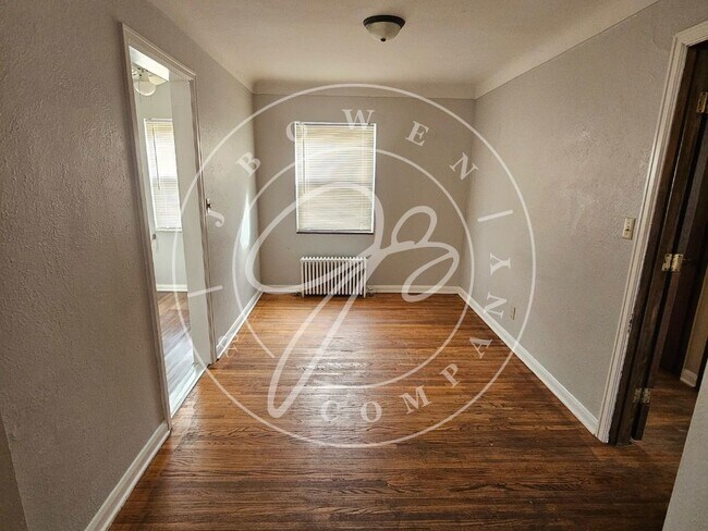 Building Photo - "Charming 2 Bedroom Rental with Hardwood F...