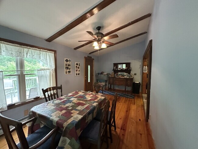 Building Photo - Charming 3BR Waterfront Retreat with Sunroom, Brick Accent & Scenic Lake Views