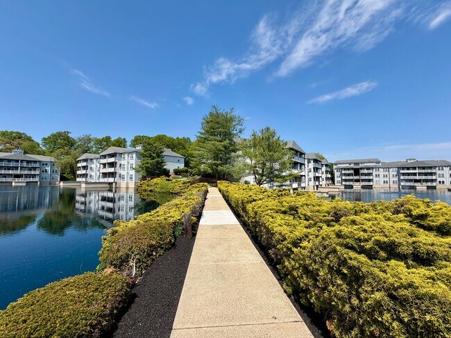 Building Photo - Welcome to Waters Edge Condos!