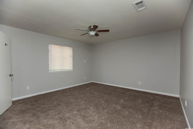 Building Photo - 10025 Whispering Pines Dr