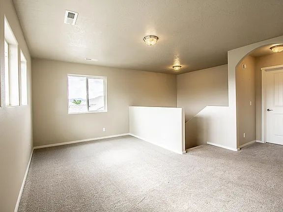 Building Photo - Beautiful 4BR, 2.5BTH, 3-Story Home in Post Falls