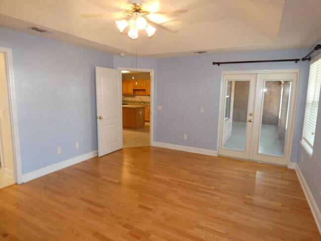 Building Photo - Charming 4-Bedroom Home With Sunroom