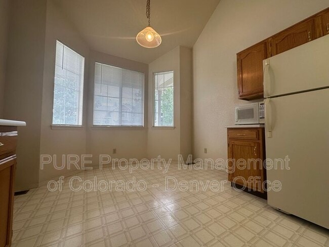 Building Photo - 9705 W Powers Cir