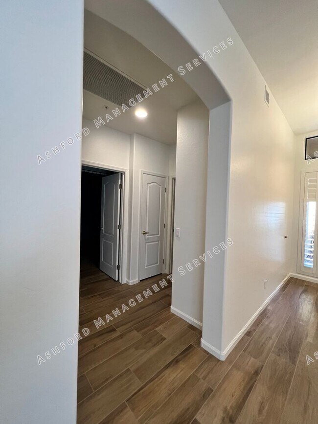 Building Photo - COME HOME TO LUXURY IN GATED GRAYHAWK GOLF...