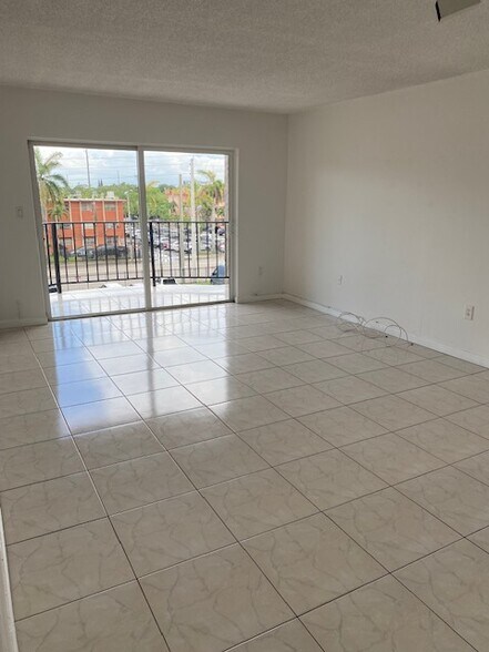 Living area and balcony - 5199 NW 7th St