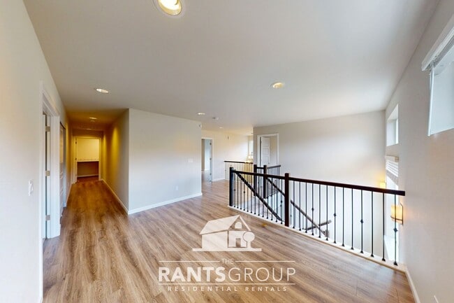 Building Photo - Luxury 4-Bedroom Home with 5-Car Garage & ...
