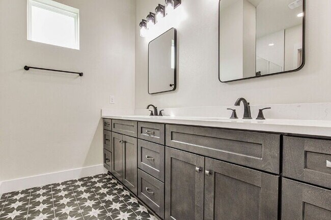 Building Photo - This luxurious new custom home in the sought-after Shadow Grove subdivision is a masterpiece of m...