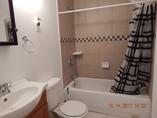 Bath has heated tile floor - 719 Johnson Ave