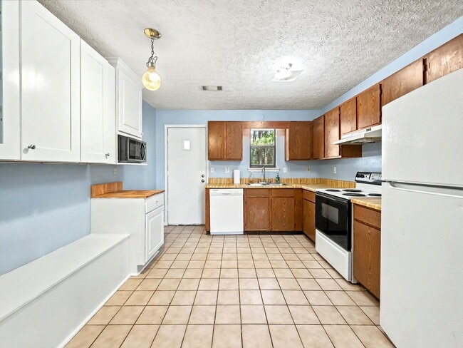 Building Photo - Tibbitts Drive Duplex