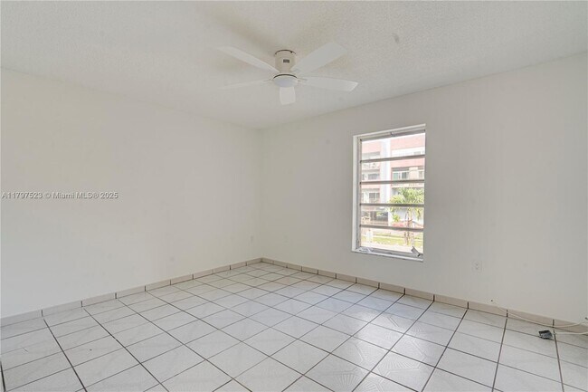 Building Photo - 6095 W 19th Ave