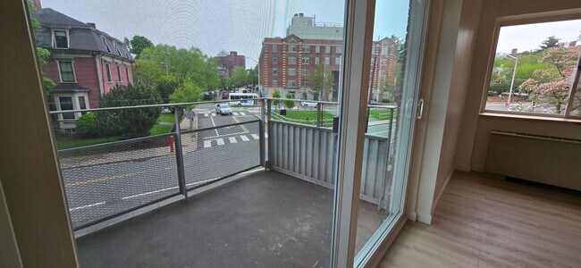 Building Photo - Everything is new! Harvard Sq! Walk to T! Large 1bd with balcony! Parking included!