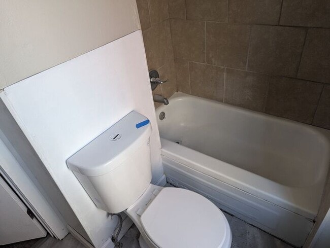 Building Photo - Great Price, Professionally Managed, Literal One Minute to Shopping and Dining!