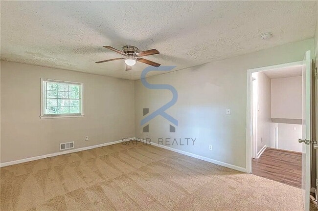 Building Photo - LIMITED-TIME OFFER! Apply today with NO APPLICATION FEE! Terms apply. Call (678) 487-7896, Option...