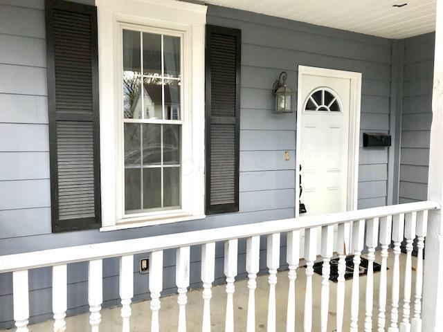 Front porch. - 711 E 6th Ave