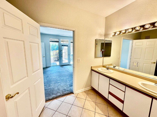 Building Photo - "Spacious 2-Bed, 2-Bath Condo with Pool Ac...