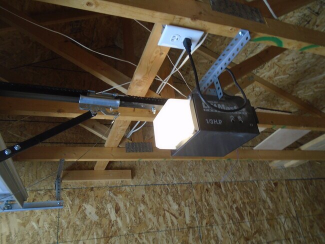 garage auto opener - 4815 Hahns Peak Dr