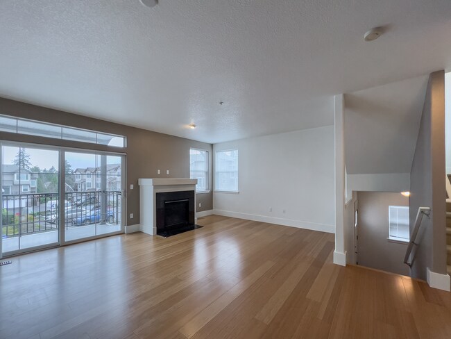 Building Photo - Enjoy this 3 Bedroom 2.5 Bathroom End Townhome ~ 2 Car Garage + Washer & Dryer! Great Cedar Mill ...