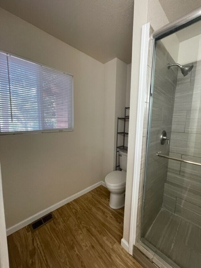 Building Photo - Low elevation condo in small complex with garage