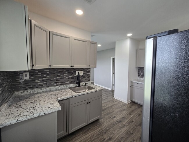 Building Photo - 9340 Moffat Ave