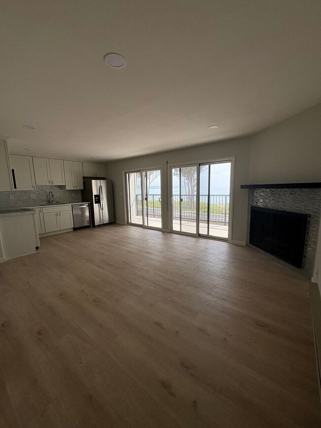 Building Photo - Remodeled Coastal Condo with Panoramic Ocean Views – One Block from New Brighton Beach