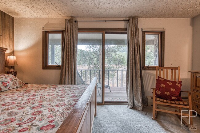 Building Photo - On the Blue River!  HUGE 4 Bedroom home, Furnished Updates throughout!  Bus route!  Spacious parking