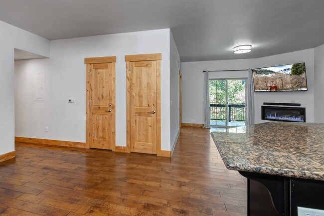 Building Photo - Unfurnished Condo Retreat with Modern Comf...