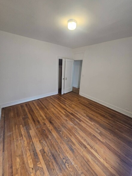 Building Photo - 59-16 Woodside Ave