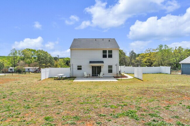 Building Photo - Stunning 3BR/2.5BA Home | Private Fenced Yard & Outdoor Oasis $2190/mo rent