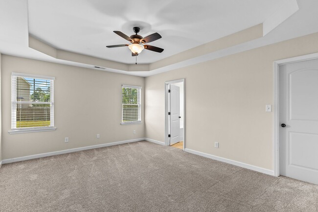 Building Photo - Spacious Home with Natural Light