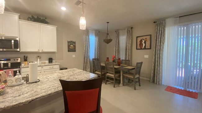 Building Photo - Fully Furnished 4-Bedroom, 2.5-Bath Home i...