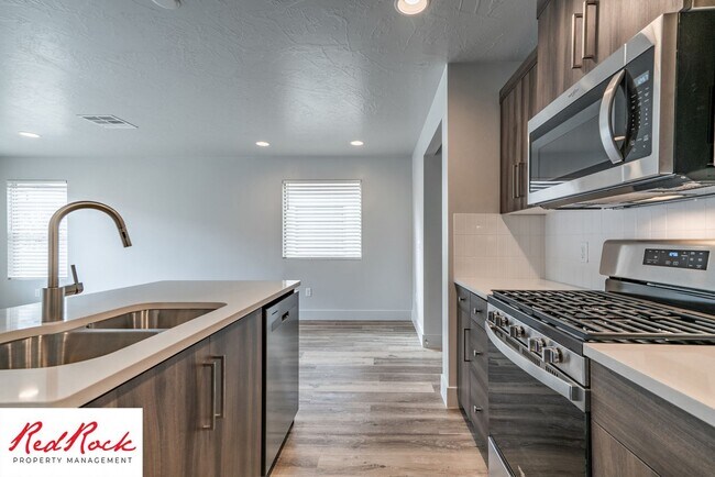 Building Photo - Innovative Design! 4 Bedroom Home in the Beautiful Desert Playa Community