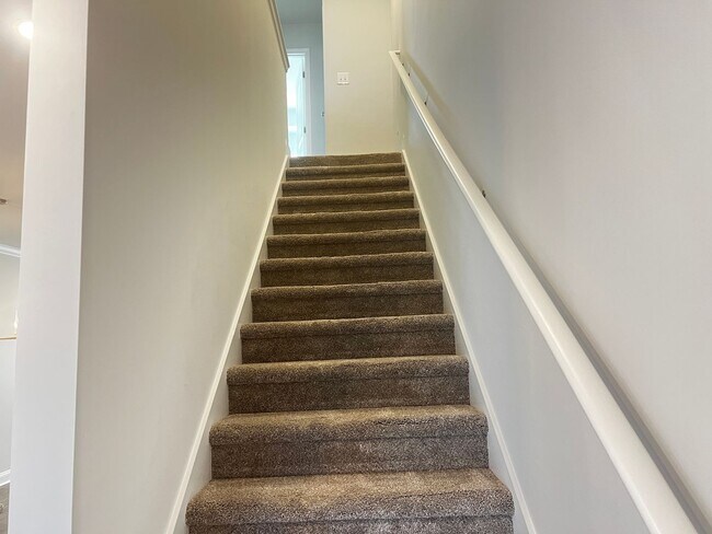 Building Photo - Available Now! - Pet Friendly 2 Bedroom, 2.5 Bath Townhome at Market Common! Cable and Internet I...