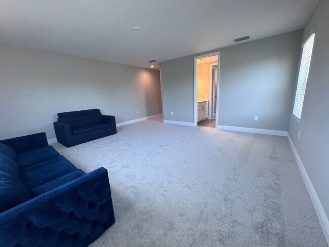 Building Photo - New Construction in Grand Park-4 Bedrooms and 4 Bathrooms with a Den and a Loft! No deposit for q...