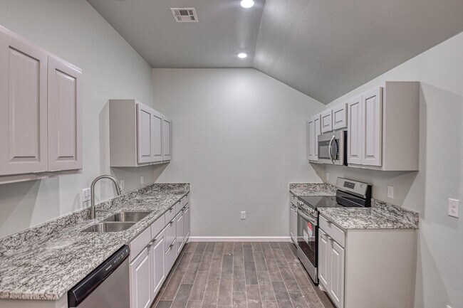 Building Photo - New Construction in Varenna Landing! Storm shelter and lawn care included!