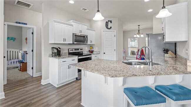 Building Photo - Relax & Unwind at this 4-Bedroom Home with Scenic Lagoon Views in Rincon