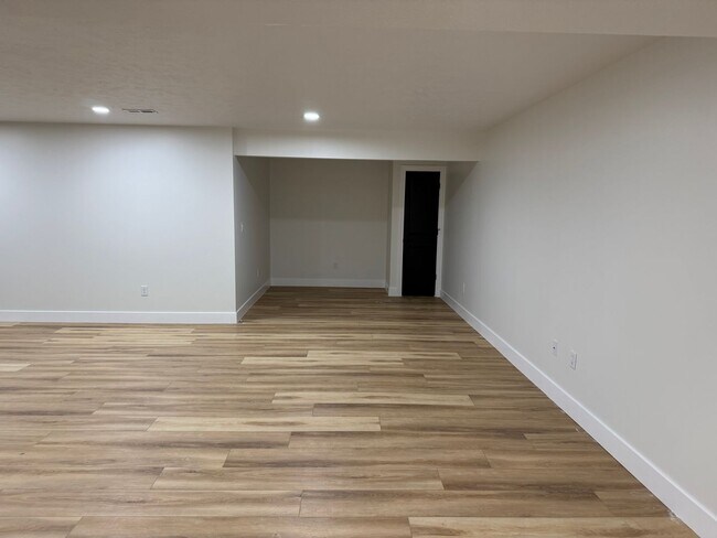 Building Photo - New Construction! West side location. 4br, 3bth, 2crg, Finished basement. All new stainless steel...