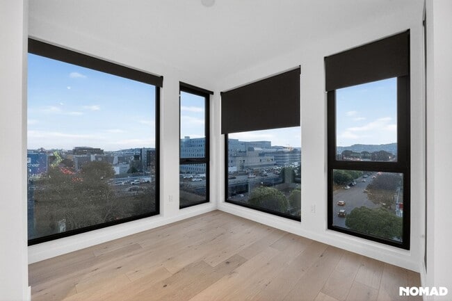 Building Photo - Act Fast: Luxury SoMa Corner Unit w/ EV Parking & Views