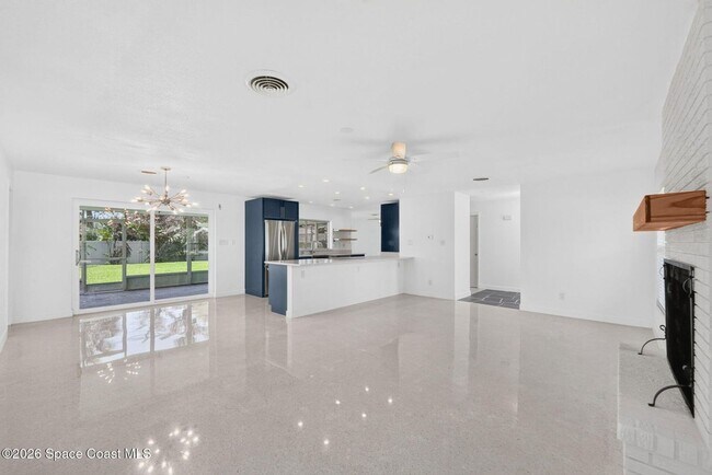Building Photo - Welcome to this beautifully remodeled 4-bedroom, 3-bath home in the heart of Indialantic Beach!