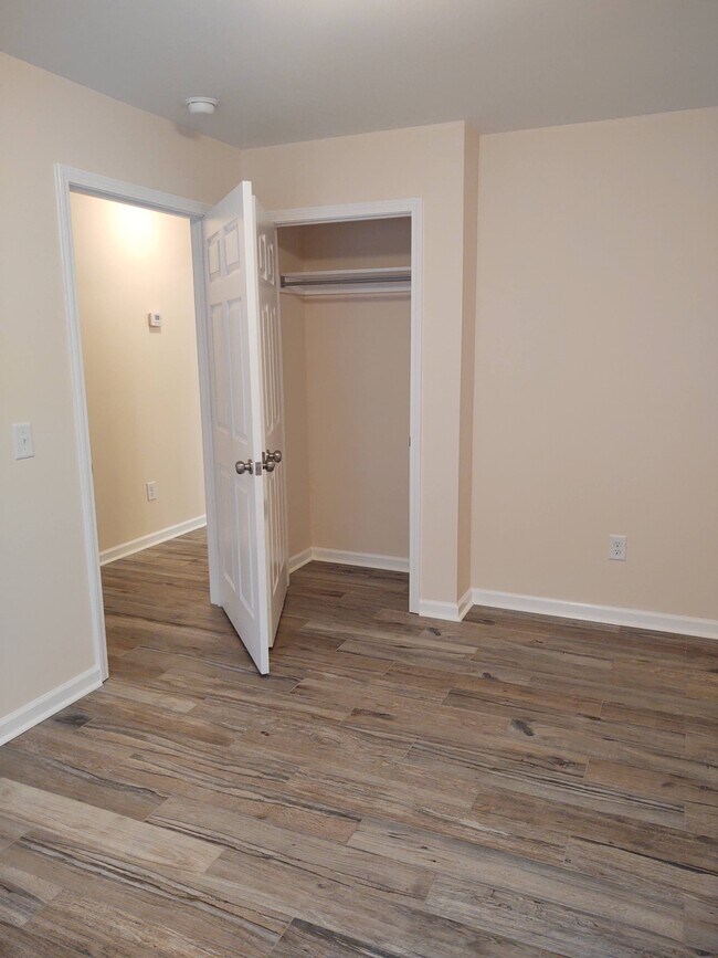 Closet and hallway view from back bedroom - 230 E Meadowlake Pky