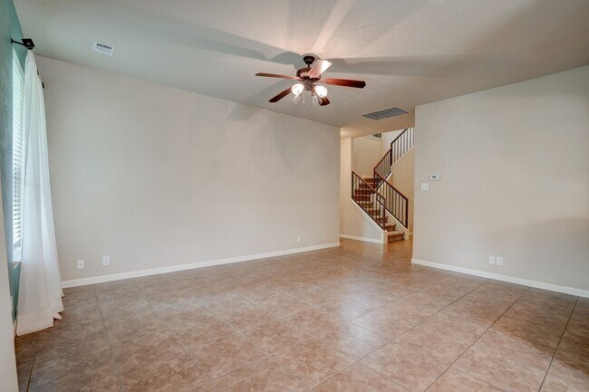 Building Photo - Bright & Roomy 4BR • 2.5BA • Two-Level Living