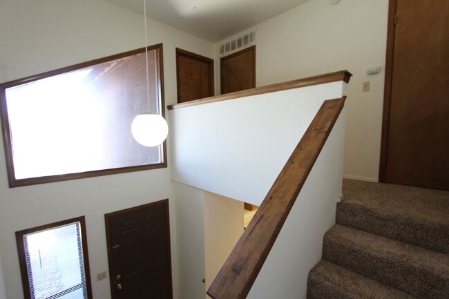 Building Photo - Bright 2BR Townhome in Boyington Heights | Private Balcony + Fenced Backyard