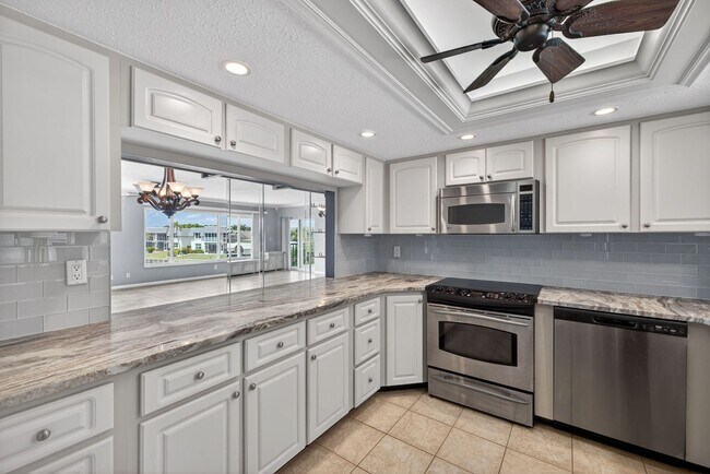 Building Photo - Gulf Access 2 bedroom 2 Bath Fully updated Condo with Water View