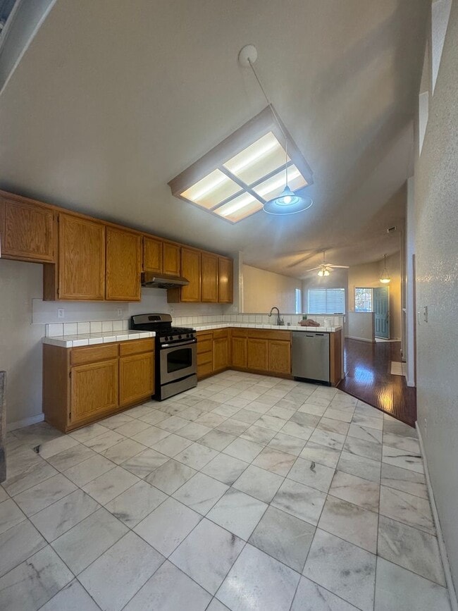 Building Photo - Beautiful 4-Bedroom Home with Solar, High ...