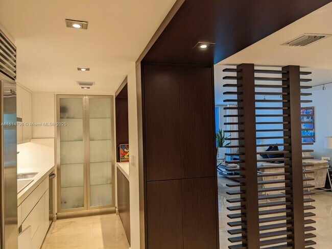 Building Photo - 9801 Collins Ave