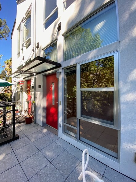 Front patio, first RED door - 44 Iron Horse Ln