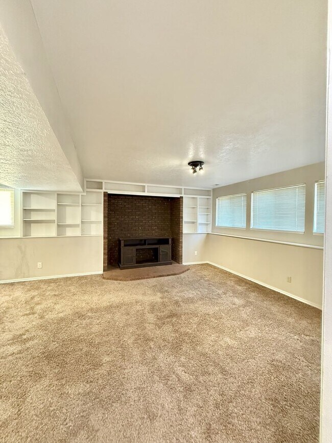 Building Photo - Spacious Comfort Meets Practical Living in...