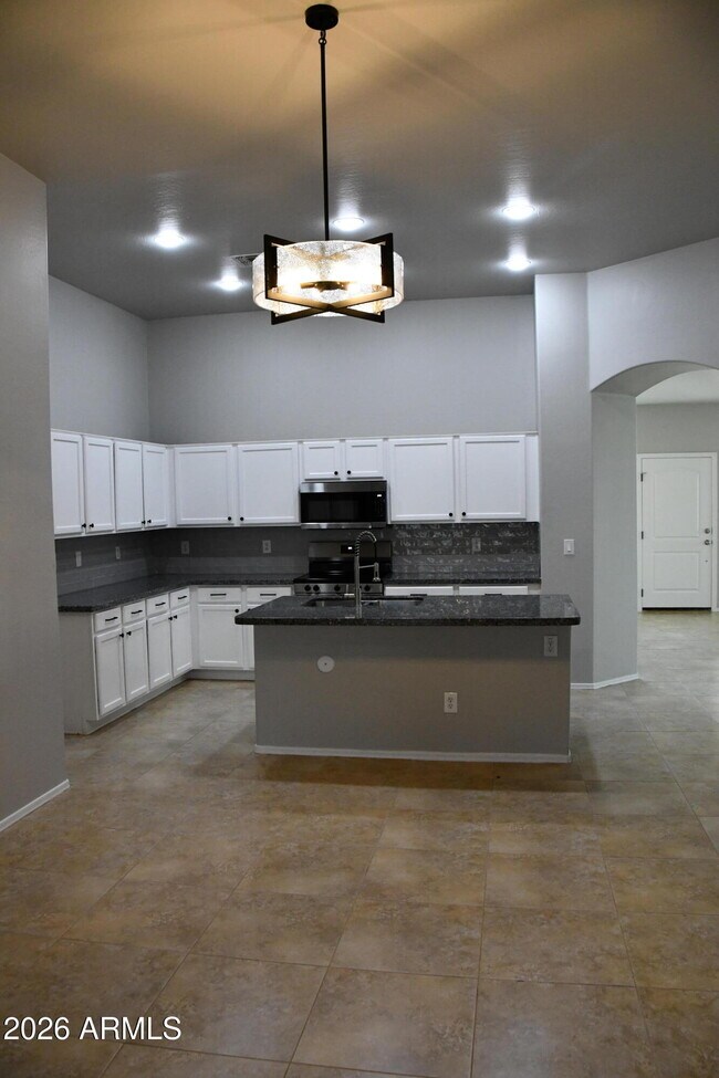 Building Photo - 8787 W Gardenia Ave