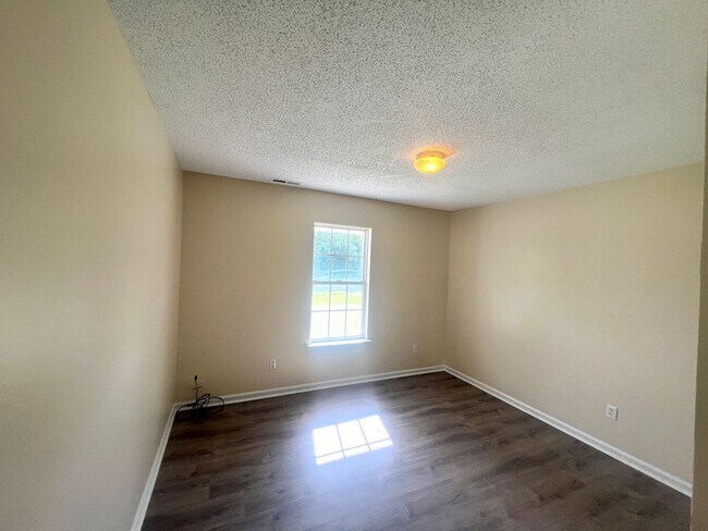 Building Photo - Freshley Painted! Updated Flooring! Pets o...