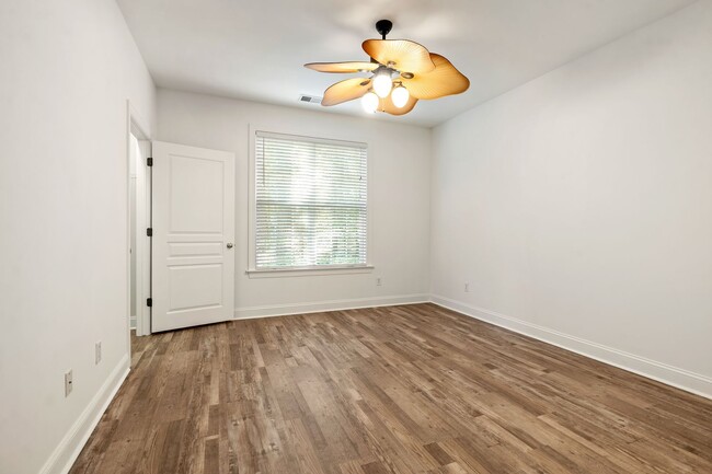 Building Photo - Ground Level 2-bed, 2-bath Condo in Providence Glen with One Car Garage and Extra Storage