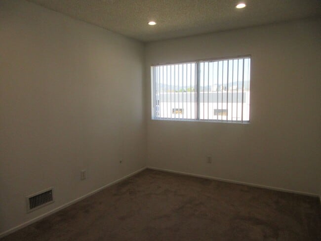 Building Photo - Duggan Property Management, Inc presents  *Reduced*  Canoga Park- 3BD 2.5BA